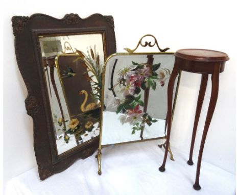 VICTORIAN BRASS FRAMED FIRE SCREEN with handpainted floral decoration to bevelled plate, with handle and raised on shaped sup