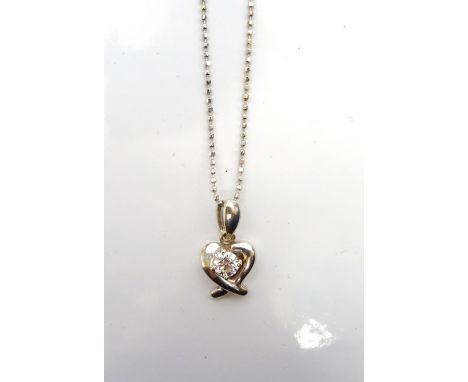 DIAMOND SET STYLISED HEART PENDANTthe round brilliant cut diamond approximately 0.2cts, in unmarked gold and on eighteen cara