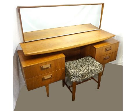 RETRO 1960s BEDROOM FURNITUREcomprising a chest of six drawers with shaped handles, raised on short tapering legs, 125cm high