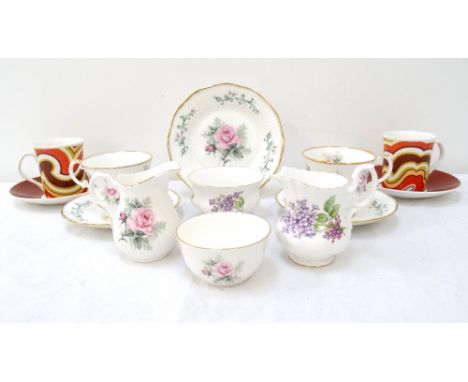 ELIZABETHAN PART COFFEE SERVICEin the Charleston pattern comprising six coffee cans and five saucers; together with an Elizab