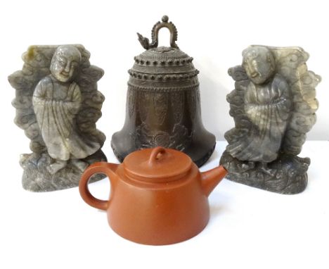 CHINESE BRONZED BELLwith looped dragon finial, mark beneath, relief decoration throughout, and shaped rim, 20cm high; a terra