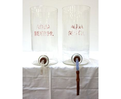 TWO VINTAGE CHEMISTS GLASS DISPENSING JARSone marked Aqua Destil, the other Aqua Menth. Pip., both with glass bungs to base, 