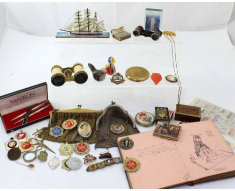 A collectors' lot to include a Madsen pen and pencil set, a mid-20th century schoolboy's stamp album, a Great War period auto