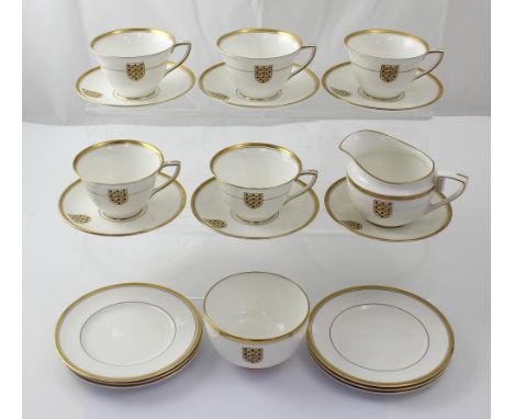 A Royal Worcester 'Viceroy' tea services decorated with the England three lions coat of arms, comprising five cups, six sauce