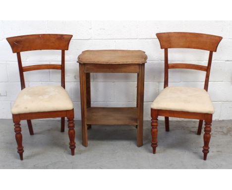 A pair of Victorian walnut dining chairs with pin stuffed seats and an oak piecrust edge occasional table with shelf stretche