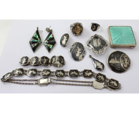 A hallmarked silver engine-turned enamel compact, a collection of Thai silver and niello jewellery, some Mexican silver, shel