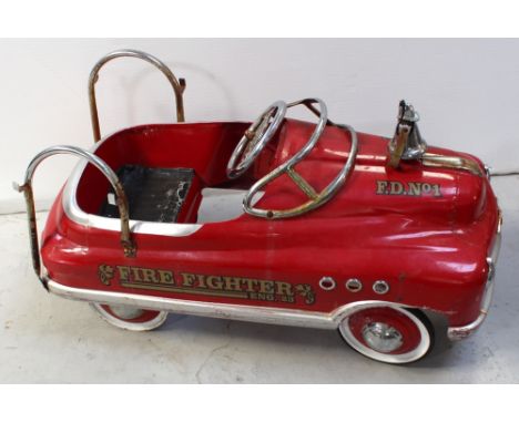 A 1950s style metal 'Fire Fighter Engine 23' child's pedal fire engine, marked 'FD No.1' to bonnet and front, with chromed fi