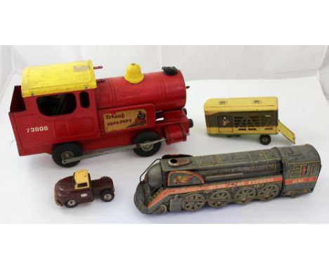 A Tri-ang 'Puff-Puff 73000' tin plate train, a Hi-Way 'Cattle Transporter' and an Overland tin plate train engine (3).
