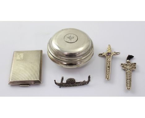 A Continental silver round trinket pot marked 800, three silver and white metal brooches; two in the form of daggers and one 