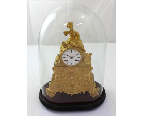 A French gilt mantel clock, the enamel dial set with Roman numerals marked 'Potonie Paris', no.8369, twin train movement stri