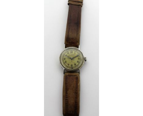 A WWII Free French Forces gentlemen's wristwatch, chrome-plated waterproof case, the cream painted dial set with luminous Ara
