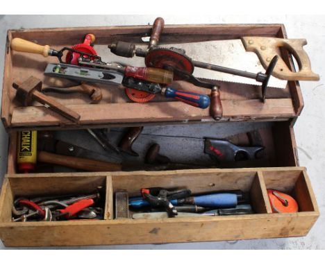 A vintage black painted toolbox with assorted mid-to-late 20th century tools, 36 x 18 x 75cm.