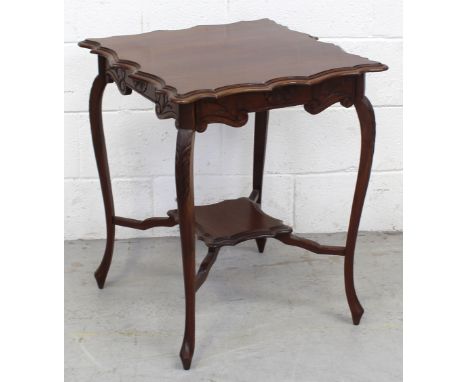 An early-to-mid 20th century walnut occasional table, square top with piecrust edge supported on cabriole legs and shelf stre