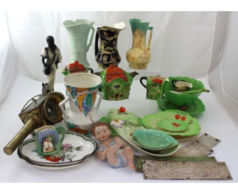 A quantity of ceramics to include Carltonware cabbage leaf ceramics, country cottage teapots, a Beswick drip glaze vase, Crow