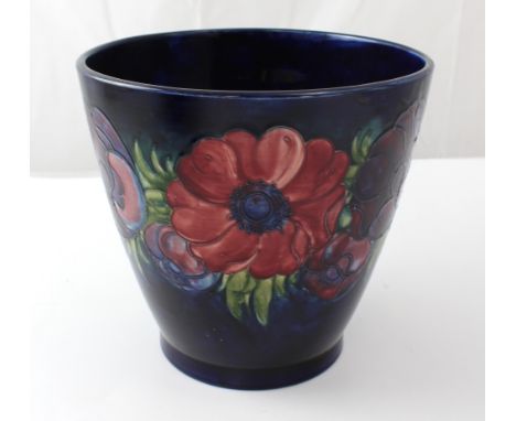 Moorcroft; an 'Anemone' pattern planter with a band of floral decoration to a cobalt blue ground, height approx 22cm, diamete