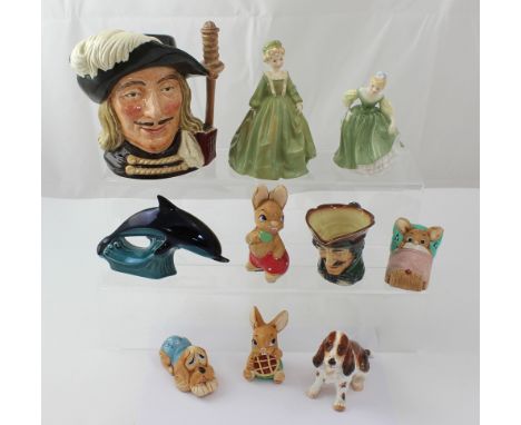 A mixed lot to include a Royal Worcester figure, 'Grandmother's Dress', a Royal Doulton character jug, 'Aramis', a small Roya