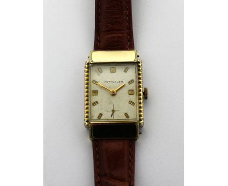Wittnauer; a c1940s gentlemen's tank-style watch, decorative case with gold filled bezel and hidden lugs, the white satin dia
