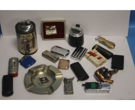 A COLLECTION OF 18 VINTAGE LIGHTERS AND AN ASHTRAY