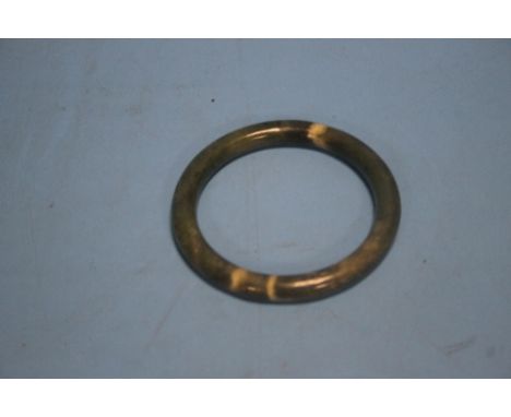 A ORIENTAL GREEN JADE BANGLE