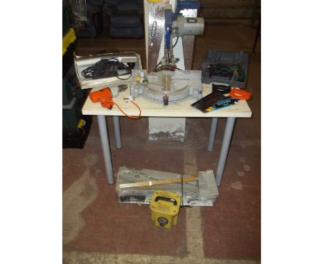 A QUANTITY OF POWER TOOLS TO INCLUDE A CHOP SAW, A BOXER PLANER AND A POWER DRILL ETC.