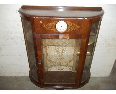 A CHINA DISPLAY CABINET WITH CLOCK A/F