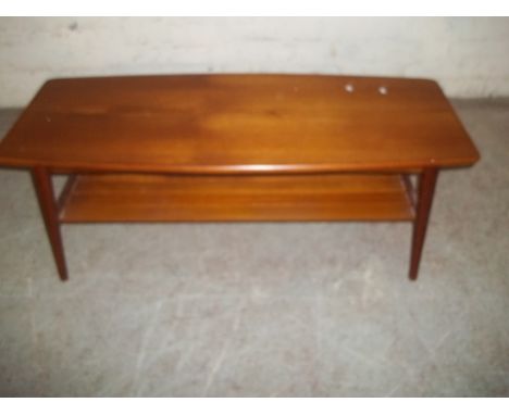 A RETRO TEAK COFFEE TABLE WITH STRETCHER SHELF