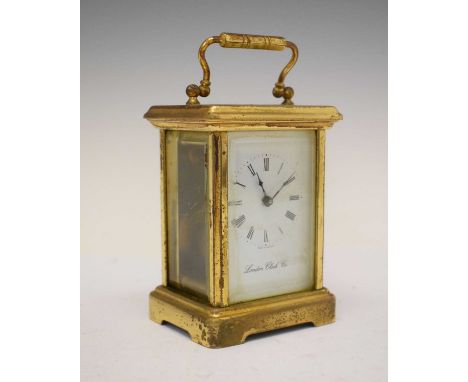 London Clock Co. gilt cased carriage clock with timepiece movement, white Roman dial, with key, 11cm high (ex.handle)