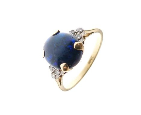 Black opal single stone ring set three diamonds to each shoulder, stamped '18ct', size N approx, 3g gross approx