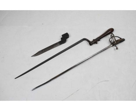 An 1876 socket bayonet, very good condition, mounted on a turned wooden handle, a No.9 bayonet, no scabbard, together with a 