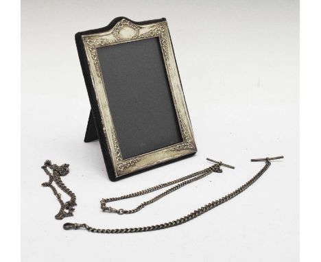 Elizabeth II silver easel picture frame, 13cm x 9.5cm, together with two silver Alberts and a white metal chain, 86.58g appro