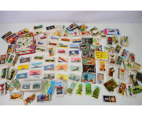 A collection of tea and similar cards with a small quantity of Batman Riddler Back cards. [W]