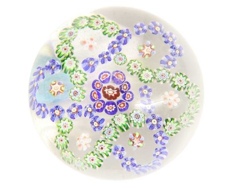 A Baccarat Garlanded Paperweight, circa 1850, the central canes within blue and green trefoil garlands8.5cm diameterTwo small