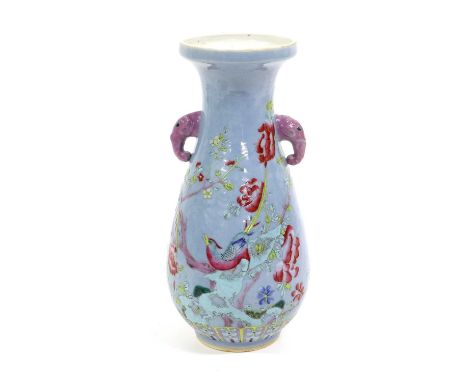 A Chinese Porcelain Vase, Kangxi mark but 19th century, of pear form and with twin elephant mask handles, ground in Claire de