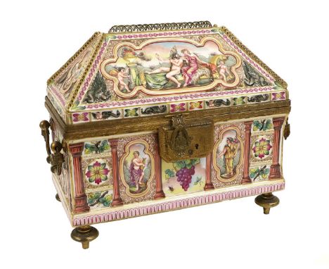 A Capodimonte Style Porcelain and Gilt Metal-Mounted Table Casket, early 20th century, of architectural form, moulded in reli