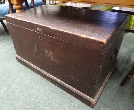 A Victorian stained pine trunk, on plinth base and with iron carrying handles 87 cm length x 51 cm width x 50 cm height appro