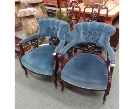 A Victorian mahogany framed, part parlour set, comprising two dining chairs and two armchairs, all with pierced and carved sp