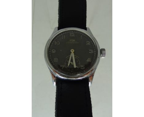 A gents German Military wristwatch.  Dial marked "ARSA, WASSERDICHT, STOSSGESICHERT", black dial, silvered Arabic numerals, s