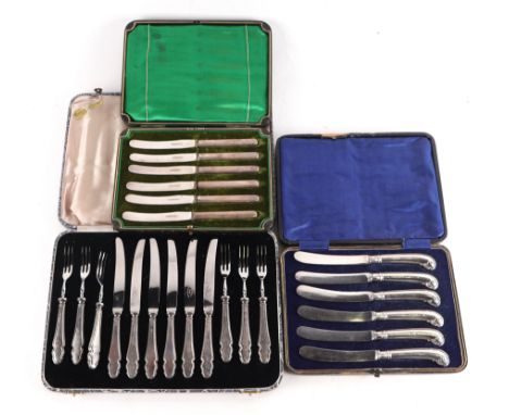 A set of six silver pistol grip handled butter knives; together with another set of silver handled butter knives; and a six-p