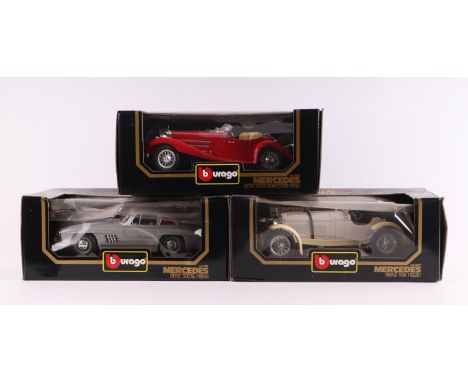 Three Bburago 1:18 scale diecast models comprising Mercedes Benz SSK (1928) cat no. 3009; another Mercedes Benz 300SL (1954) 