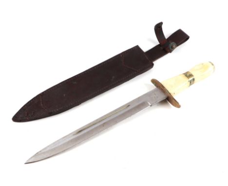 A large bone handled dagger with Centaur makers mark on the ricasso, having a very sharp single edged blade, In its leather s