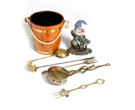 A 19th century Dutch coopered teak pail with a rope handle, together with a collection of brassware to include two chestnut r
