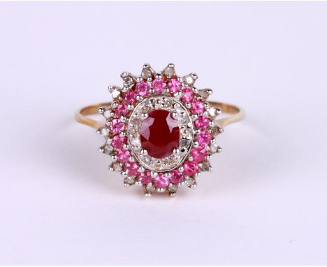 A 9ct gold ruby and diamond cluster ring, approx UK size 'P', 2.1g.