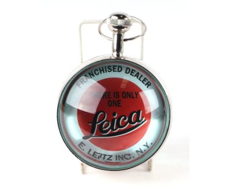 A modern orb clock Leica Franchise Dealer, 10cms diameter; together with another Smith-Lene Gasoline orb clock (2).