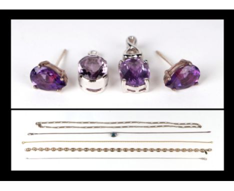 A pair of white metal mounted amethyst stud earrings; together with two white metal mounted amethyst set pendant drops; two s