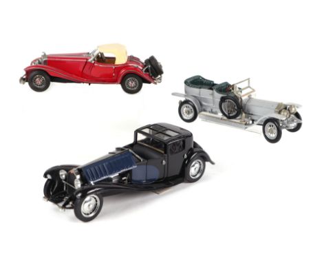 Three Franklin Mint 124 scale diecast cars comprising 1930 Bugatti Royale Coupe Napoleon, a 1935 Mercedes Benz 500K Special R