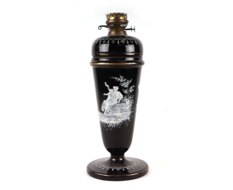 A Victorian Mary Gregory style glass oil lamp decorated with a neoclassical scene, 52cms high including fitting.
