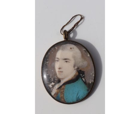 A 19th century portrait miniature on ivory, a Georgian gentleman wearing a blue coat, 3 by 3.5cms. ( ivory Submission referen