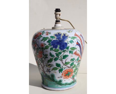 A large Chinese famille vert vase lamp decorated with flowering foliage and birds, 32cms high.Condition ReportThe top of the 