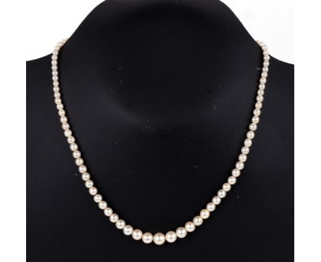 A graduated pearl necklace with sterling silver pearl and marcasite clasp, total length 42cms.