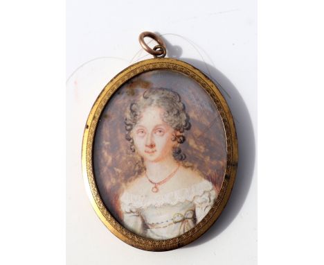 A  19th century portrait miniature on ivory depicting a young lady with ringlets wearing a necklace, in a gilt metal mount, o